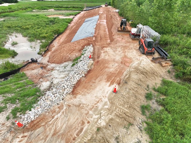Headwall and inlet structure with surrounding grade